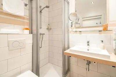 Ein Badezimmer in der Unterkunft Airport Fashion Hotel
