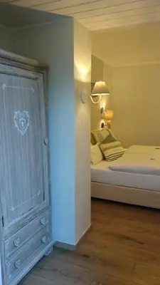 Ein Bett oder Betten in einem Zimmer der Unterkunft Hotel Villa Verde
