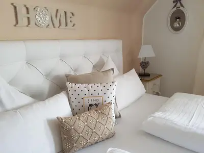 Ein Bett oder Betten in einem Zimmer der Unterkunft Hotel Villa Verde