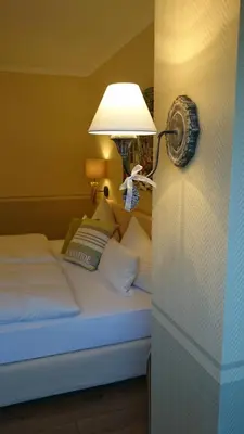 Ein Bett oder Betten in einem Zimmer der Unterkunft Hotel Villa Verde