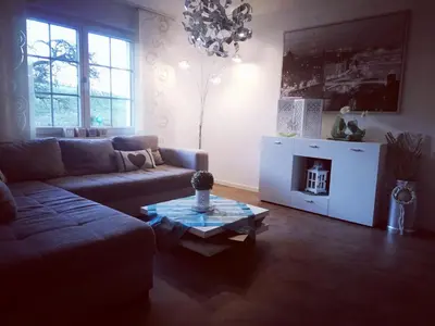 Ein Sitzbereich in der Unterkunft Ferienwohnung auf der Hilkenhöhe