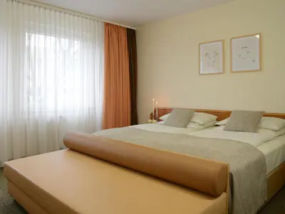 Ein Bett oder Betten in einem Zimmer der Unterkunft Hotel Residenz Oberhausen