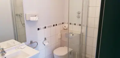 Ein Badezimmer in der Unterkunft Akzent Hotel Gut Höing