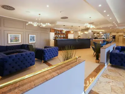 Ein Sitzbereich in der Unterkunft DORMERO Hotel Meerbusch