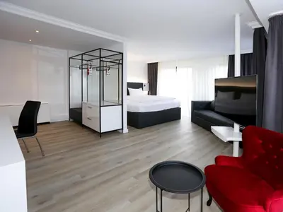 Ein Bett oder Betten in einem Zimmer der Unterkunft DORMERO Hotel Meerbusch