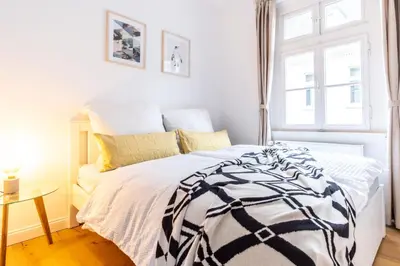 Ein Bett oder Betten in einem Zimmer der Unterkunft cruwzo I Apartments in Wuppertal