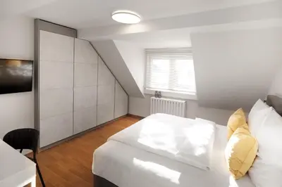 Ein Bett oder Betten in einem Zimmer der Unterkunft SAXX Apartments Hagen