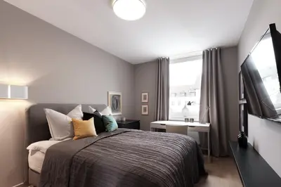 Ein Bett oder Betten in einem Zimmer der Unterkunft SAXX Apartments 