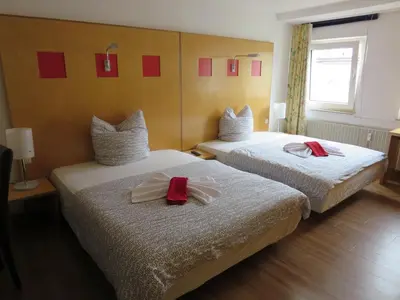 Ein Bett oder Betten in einem Zimmer der Unterkunft Ruhrzimmer