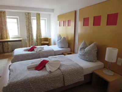 Ein Bett oder Betten in einem Zimmer der Unterkunft Ruhrzimmer