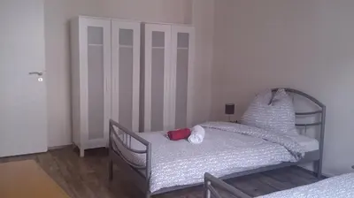 Ein Bett oder Betten in einem Zimmer der Unterkunft Ruhrzimmer