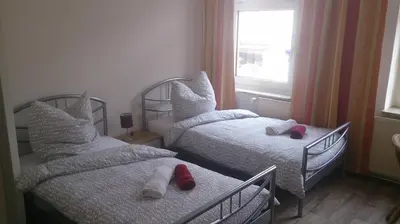 Ein Bett oder Betten in einem Zimmer der Unterkunft Ruhrzimmer