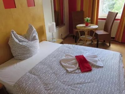 Ein Bett oder Betten in einem Zimmer der Unterkunft Ruhrzimmer