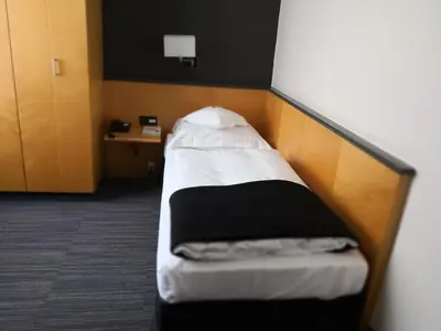 Ein Bett oder Betten in einem Zimmer der Unterkunft Hotel Lindenhof