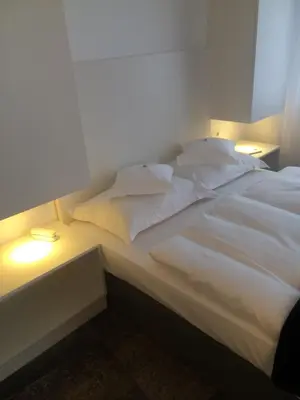 Ein Bett oder Betten in einem Zimmer der Unterkunft Hotel Lindenhof