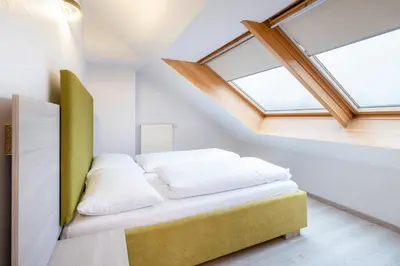 Ein Bett oder Betten in einem Zimmer der Unterkunft HOTEL Am Spichernplatz