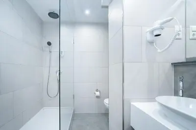 Ein Badezimmer in der Unterkunft HOTEL Am Spichernplatz