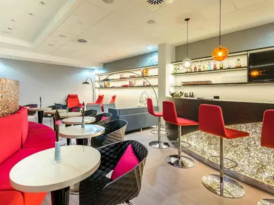 Ein Sitzbereich in der Unterkunft Mercure Hotel Düsseldorf Zentrum