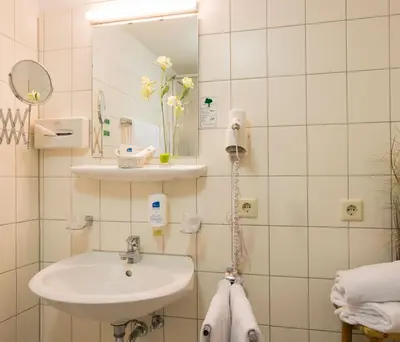 Ein Badezimmer in der Unterkunft Hotel Dampfmühle