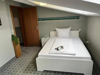Ein Bett oder Betten in einem Zimmer der Unterkunft Hotel Dampfmühle