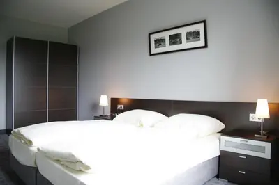 Ein Bett oder Betten in einem Zimmer der Unterkunft Hotel Dampfmühle