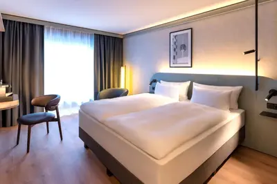Ein Bett oder Betten in einem Zimmer der Unterkunft Radisson Hotel Dusseldorf City Center