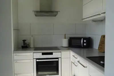 Küche/Küchenzeile in der Unterkunft Modernes Apartment Duisburg
