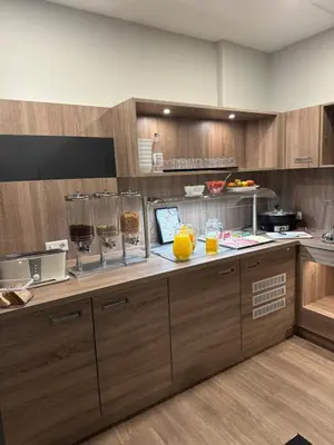 Küche/Küchenzeile in der Unterkunft Hotel Am Vogelsanger Weg