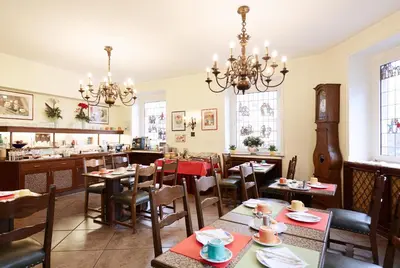 Ein Restaurant oder anderes Speiselokal in der Unterkunft Doria