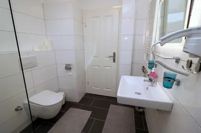 Ein Badezimmer in der Unterkunft Aparthotel Kompass A 201