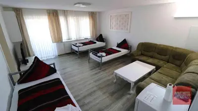Ein Sitzbereich in der Unterkunft Aparthotel Kompass A 201