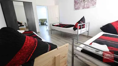 Ein Bett oder Betten in einem Zimmer der Unterkunft Aparthotel Kompass A 201