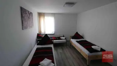 Ein Bett oder Betten in einem Zimmer der Unterkunft Aparthotel Kompass A 201