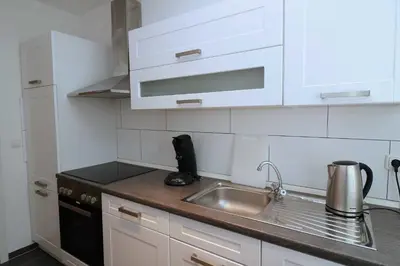 Küche/Küchenzeile in der Unterkunft Aparthotel Kompass A 302-303