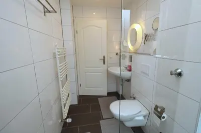 Ein Badezimmer in der Unterkunft Aparthotel Kompass A 302-303