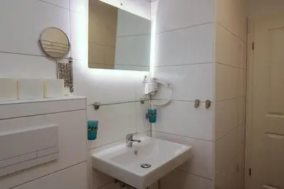 Ein Badezimmer in der Unterkunft Aparthotel Kompass A 401