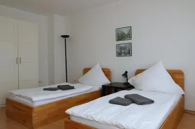 Ein Bett oder Betten in einem Zimmer der Unterkunft Aparthotel Kompass A 402-403