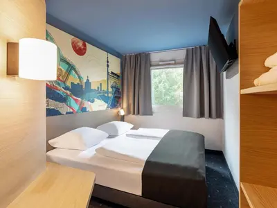 Ein Bett oder Betten in einem Zimmer der Unterkunft B&B HOTEL Dortmund-West