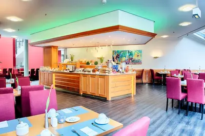 Ein Restaurant oder anderes Speiselokal in der Unterkunft ACHAT Hotel Bochum Dortmund