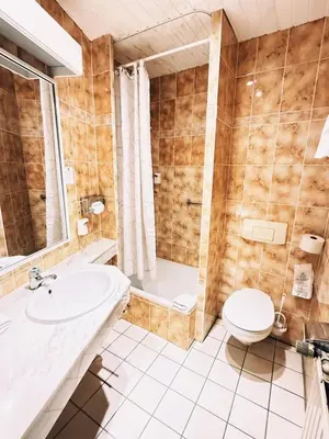 Ein Badezimmer in der Unterkunft Burghotel Volmarstein
