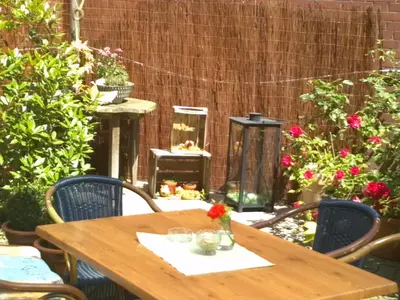 Ein Garten an der Unterkunft Plettenberger Hof