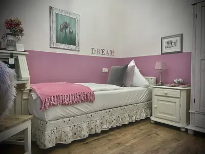 Ein Bett oder Betten in einem Zimmer der Unterkunft Hotel Am Volksgarten