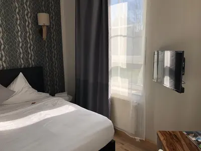 Ein Bett oder Betten in einem Zimmer der Unterkunft Hotel Restaurant zum Löwen