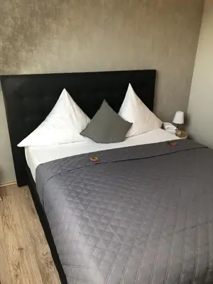 Ein Bett oder Betten in einem Zimmer der Unterkunft Hotel Restaurant zum Löwen