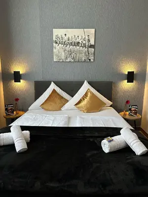 Ein Bett oder Betten in einem Zimmer der Unterkunft Hotel Restaurant zum Löwen
