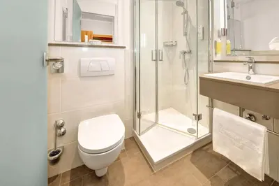 Ein Badezimmer in der Unterkunft Ringhotel Zweibruecker Hof