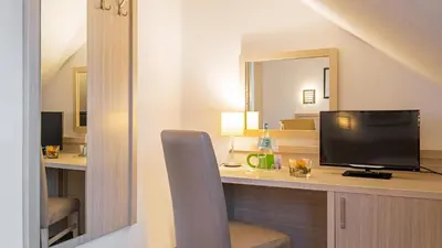 TV/Unterhaltungsangebot in der Unterkunft Air Hotel Wartburg