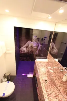 Ein Badezimmer in der Unterkunft PLAZA INN stays design Dortmund