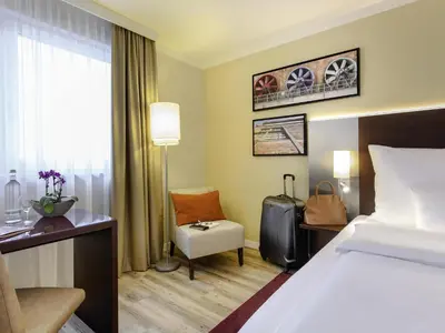 Ein Bett oder Betten in einem Zimmer der Unterkunft Mercure Hotel Duisburg City