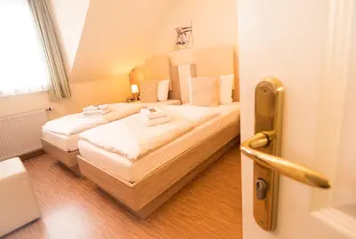Ein Bett oder Betten in einem Zimmer der Unterkunft Hotel Carlton Mayfair